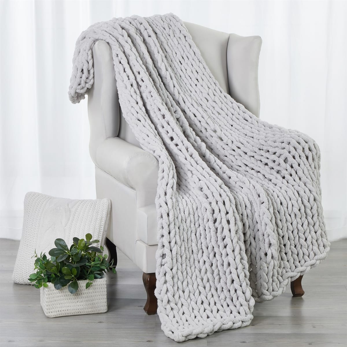 Jane: $49.99 + FREE Shipping Kathy Ireland Chunky Knit Chenille Throw (reg. $199.99; SAVE 75%)